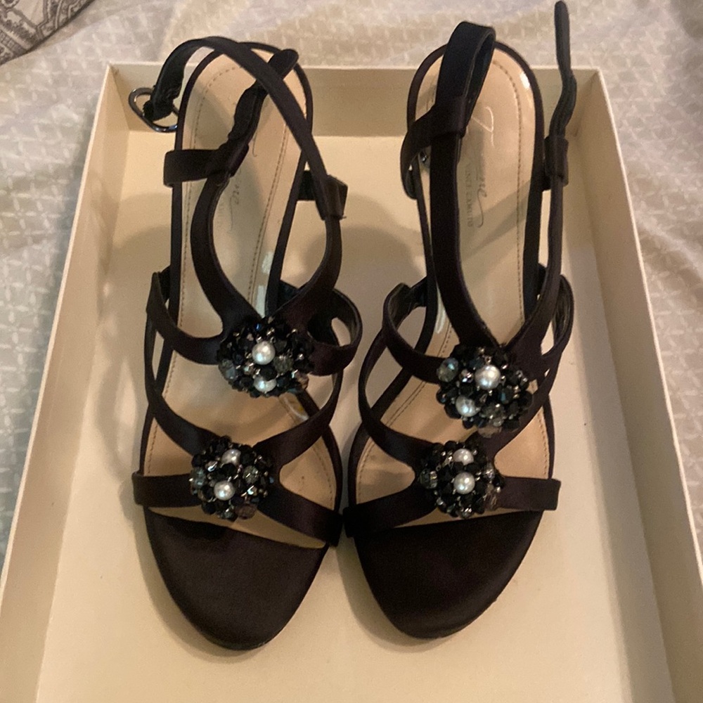 Has few scratches on the Inside of the shoes and the bottom heel.